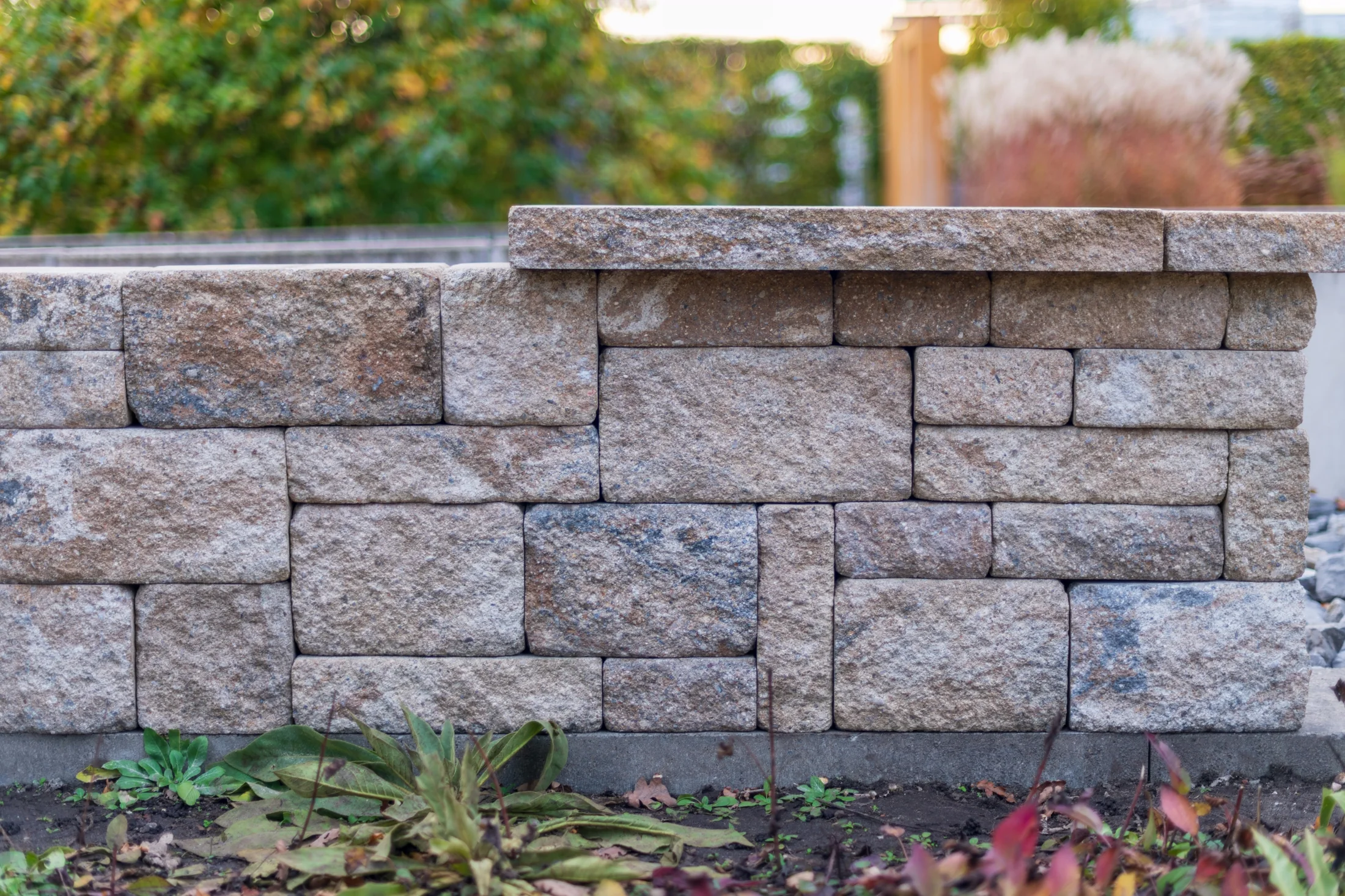 Retaining wall plan with wall path, slope, drainage, terraces, and finish areas