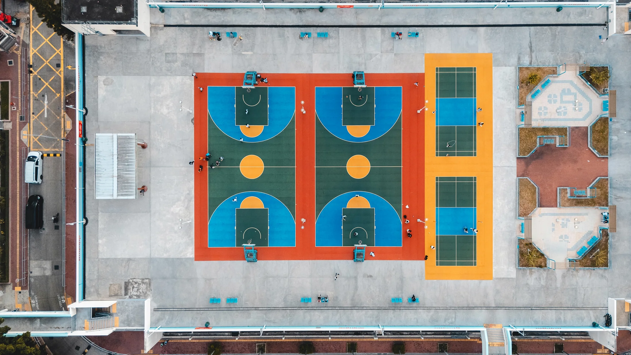 Aerial backyard sport court plan with pickleball, basketball, and tennis line layouts